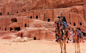 Vendors Sell Rides on Camels, Donkeys, and Horses