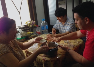 Justin Under the Wing of our Chinese Family - Learning the Ancient, Noble Art of Dumpling-ing...