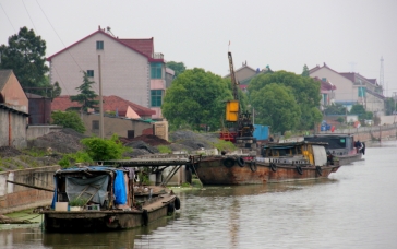 Barges are used for both transporting goods and also for housing...